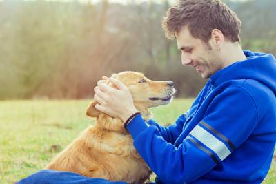 It's taken some 30,000 years for dogs to reach their current relationship with humans—they're now members of the family. Photo credit: Gaxy89/iStock