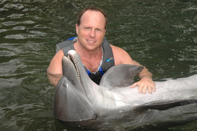 Steve Appelbaum with a dolphin